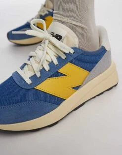 New Balance 370 Trainers In Blue And Yellow For Unisex -New Balance Shop 206661940 3