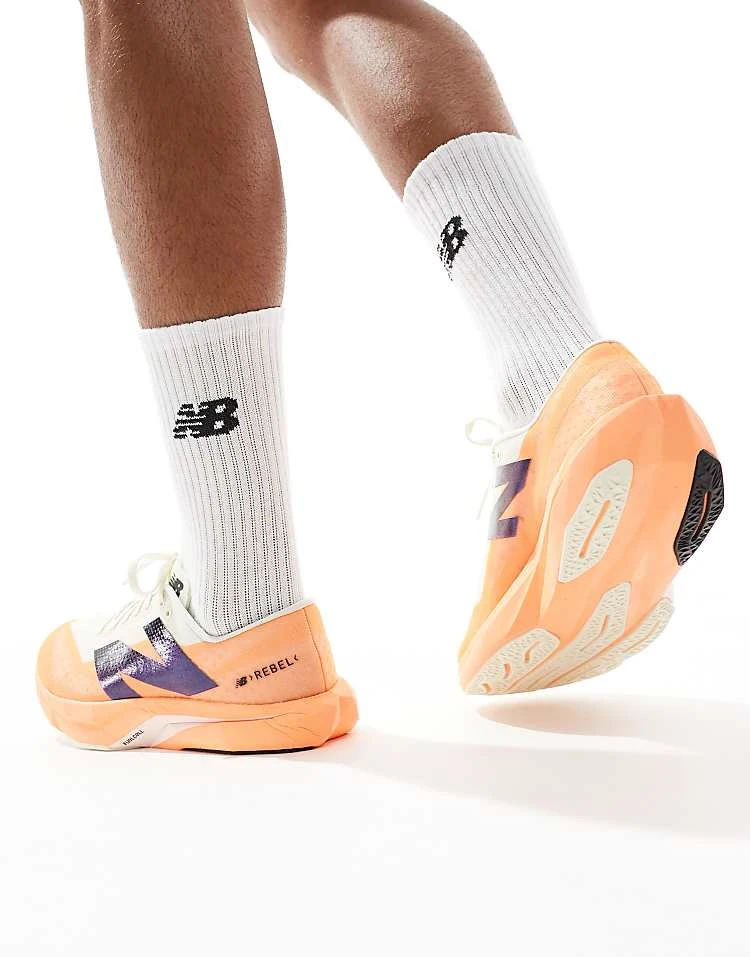 New Balance Fuelcell Rebel V4 Running Trainers In Orange For Men 5 New Balance Fuelcell Rebel V4 Running Trainers In Orange For Men - Image 3