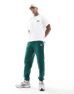 New Balance Sport Essentials Fleece Jogger In Green For Men