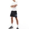 New Balance Sport Essentials Lined Graphic Short 7" In Black For Men